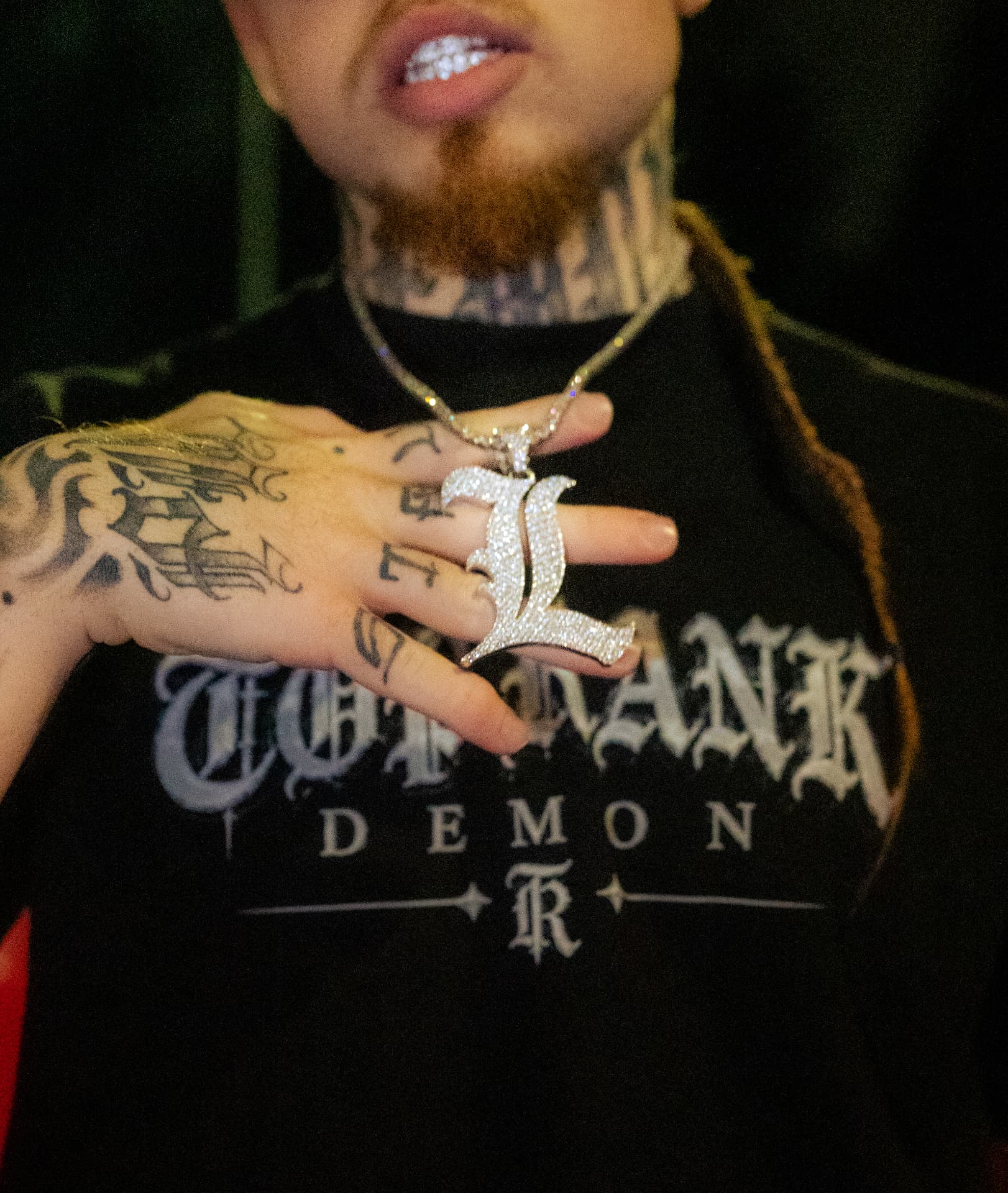 Close-up of 1TopRankDemon4 wearing the TOP RANK DEMON gothic front print tee